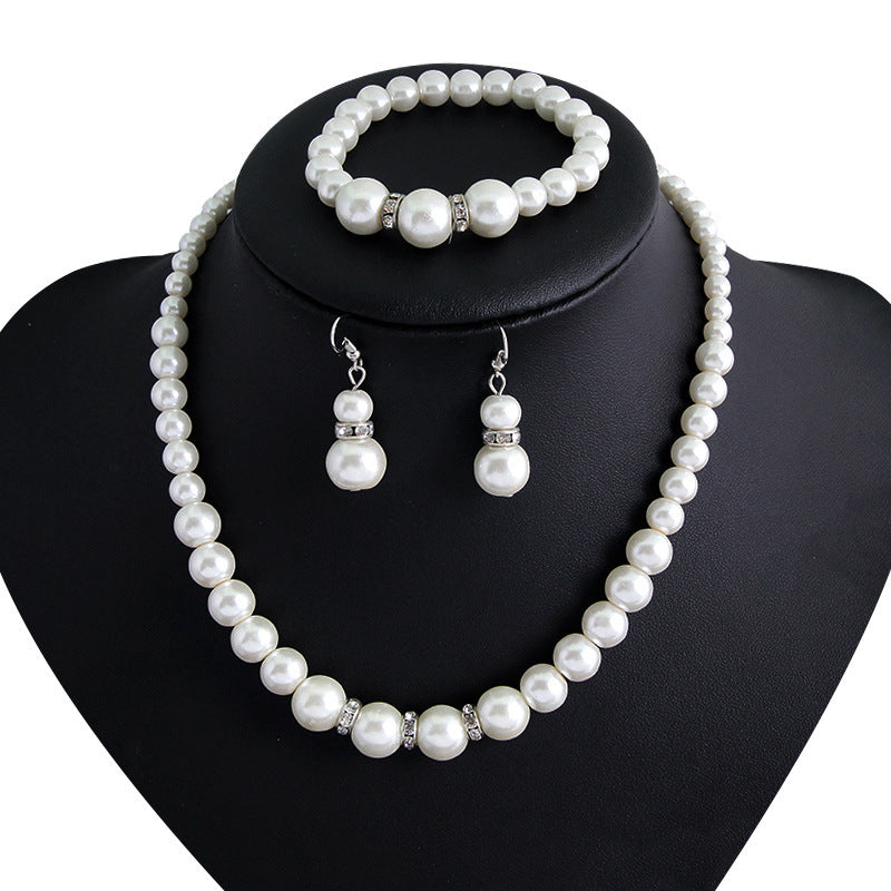 Three-piece Pearl Necklace Earrings And Bracelet