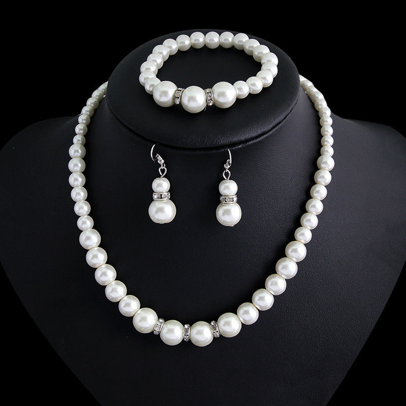 Three-piece Pearl Necklace Earrings And Bracelet